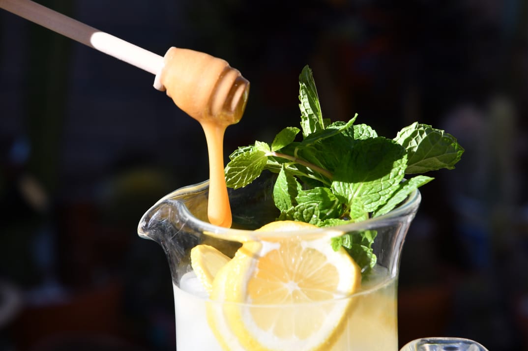 SAMU manuka being drizzled in lemonade pitcher