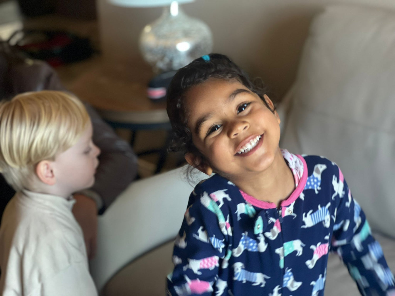 Smiling young girl with foster brother