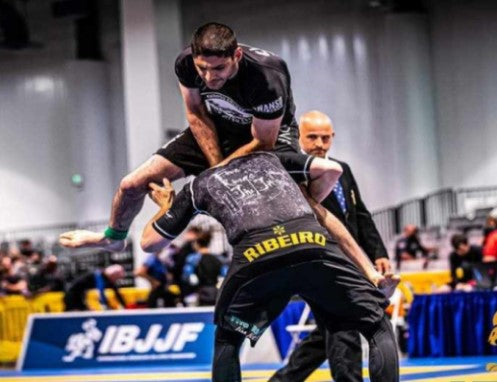 Jason Youseph flying triangle choke in tournament